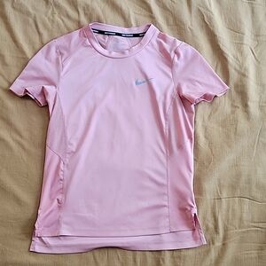 Small pink Nike running shirt